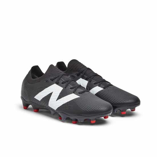 New Balance Tekela V4+ Pro Low Firm Ground Football Boots Черно/Бяло Футболни стоножки