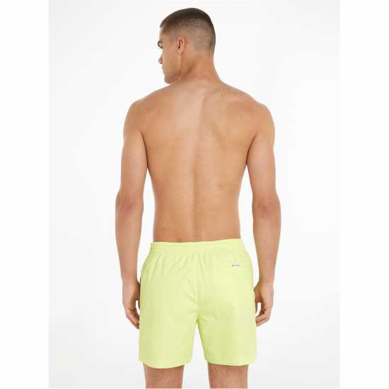 Calvin Klein Мъжки Плувни Шорти Medium Tape Swim Shorts Mens Слънчево лимон LLD Мъжки къси панталони