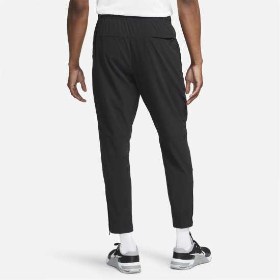 Nike Unlimited Men's Dri-FIT Zippered Cuff Versatile Pants Трикратно черно Мъжки спортни екипи в две части