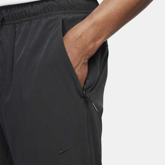 Nike Unlimited Men's Dri-FIT Zippered Cuff Versatile Pants Трикратно черно Мъжки спортни екипи в две части