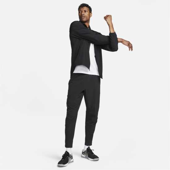 Nike Unlimited Men's Dri-FIT Zippered Cuff Versatile Pants Трикратно черно Мъжки спортни екипи в две части