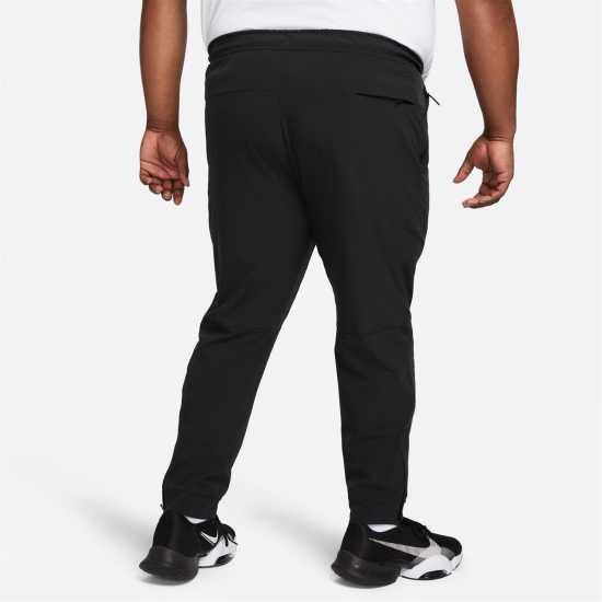 Nike Unlimited Men's Dri-FIT Zippered Cuff Versatile Pants Трикратно черно Мъжки спортни екипи в две части